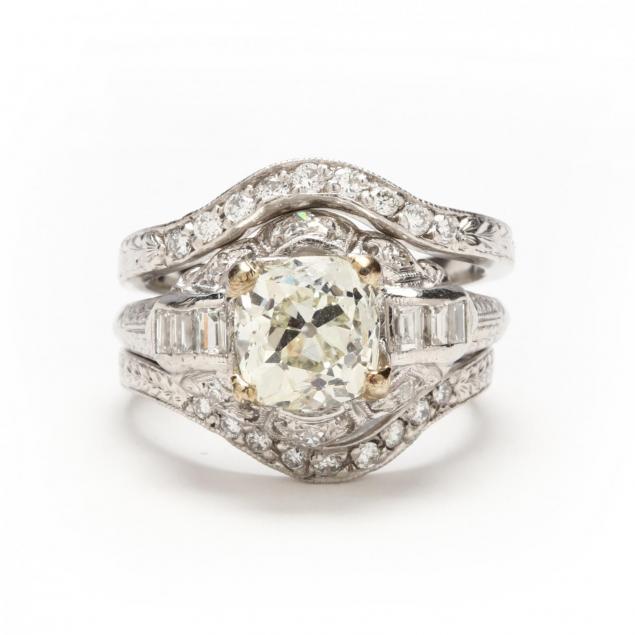 antique-platinum-diamond-ring-with-platinum-and-diamond-bands