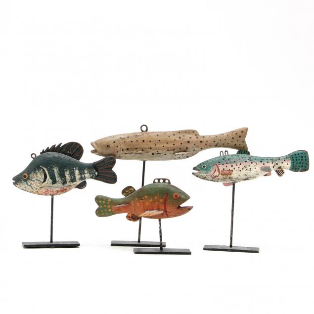 four-vintage-wooden-fish-decoys