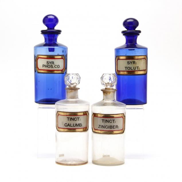 two-pairs-of-apothecary-bottles-with-unusual-stoppers