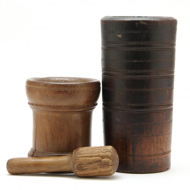 two-wooden-mortars-and-a-wooden-pestle