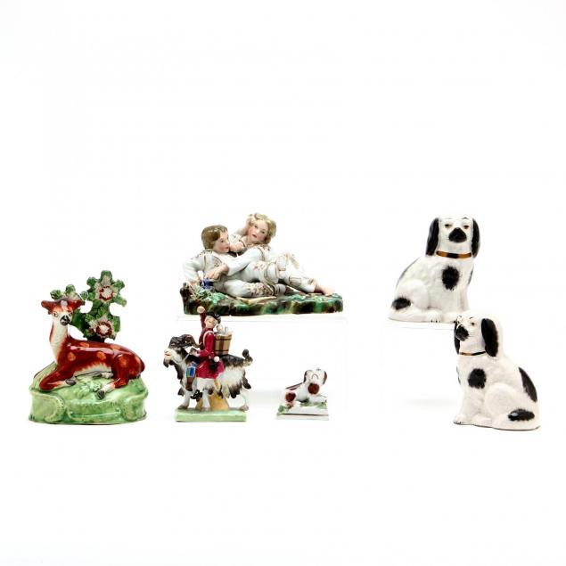 a-group-of-antique-vintage-ceramic-figures