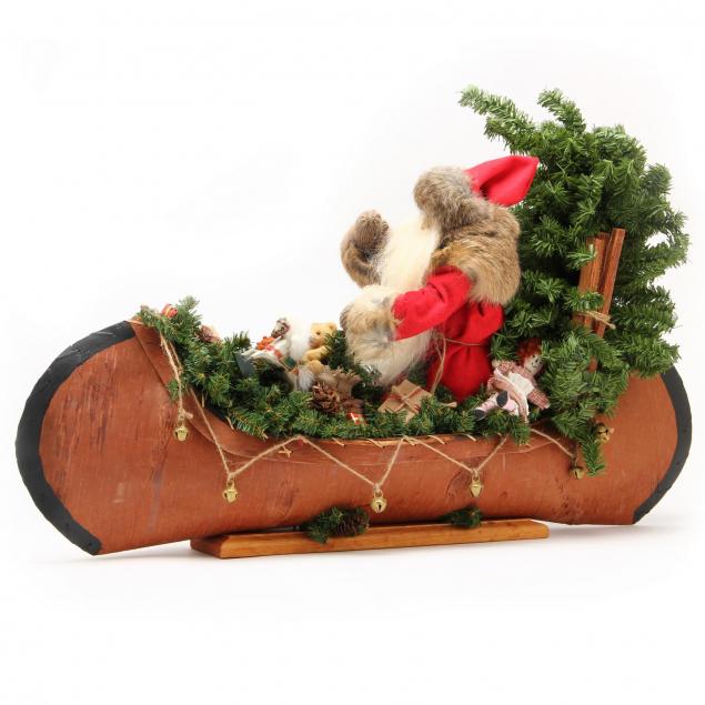lynn-haney-santa-in-canoe