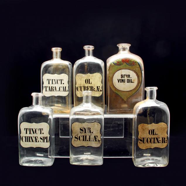 six-early-apothecary-bottles