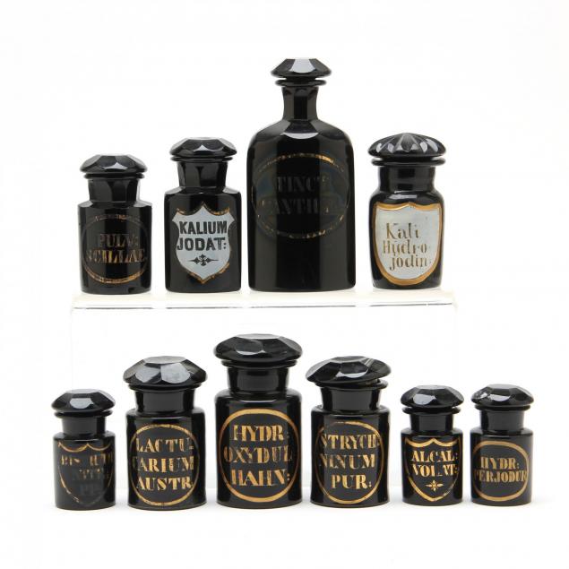 group-of-rare-black-amethyst-apothecary-bottles
