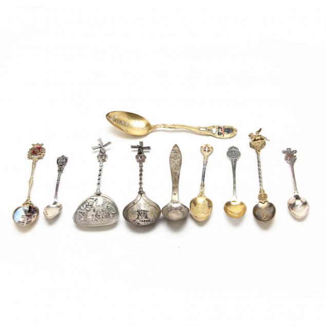 group-of-silver-souvenir-spoons