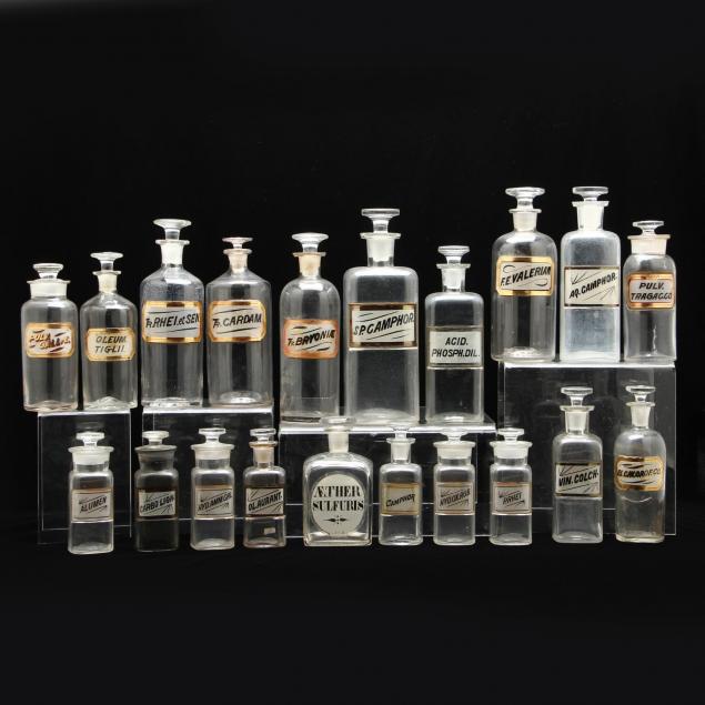 an-assortment-of-glass-apothecary-bottles