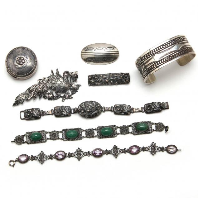 a-collection-of-silver-jewelry-items