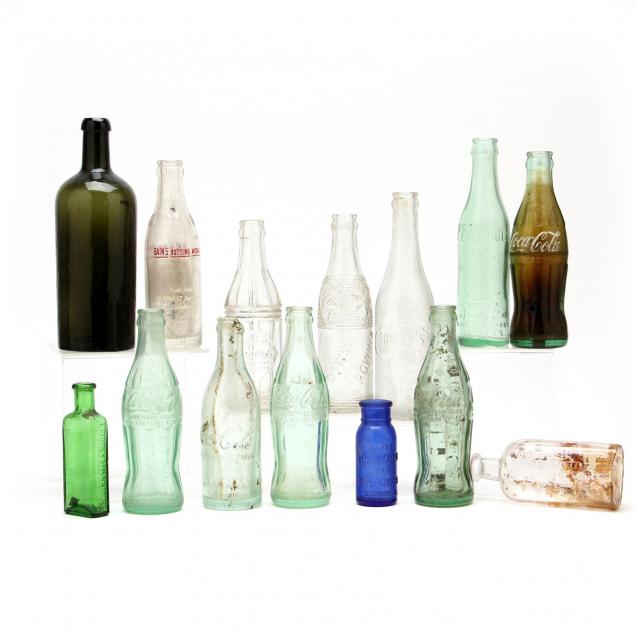 group-of-antique-and-vintage-advertising-bottles
