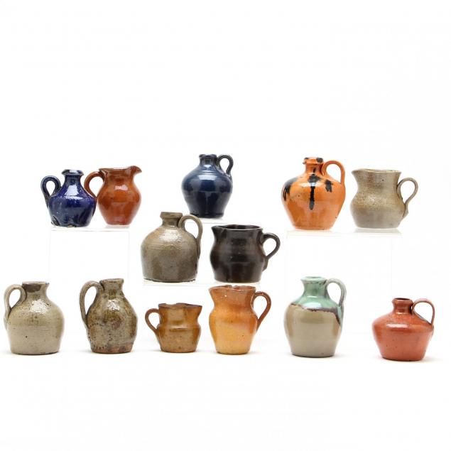 group-of-nc-pottery-small-jugs-and-pitchers