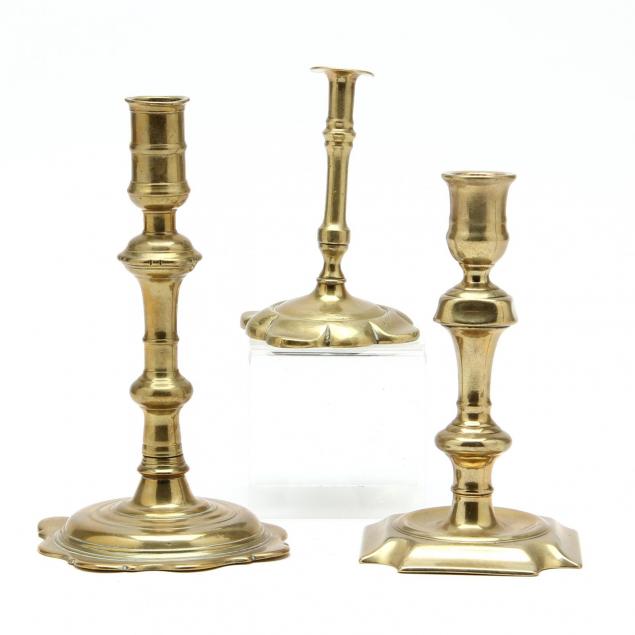 three-antique-queen-anne-brass-candlesticks