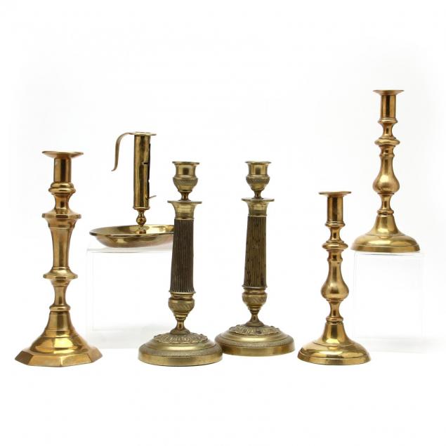 six-antique-brass-candlesticks