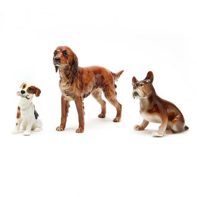 three-porcelain-dog-figurines