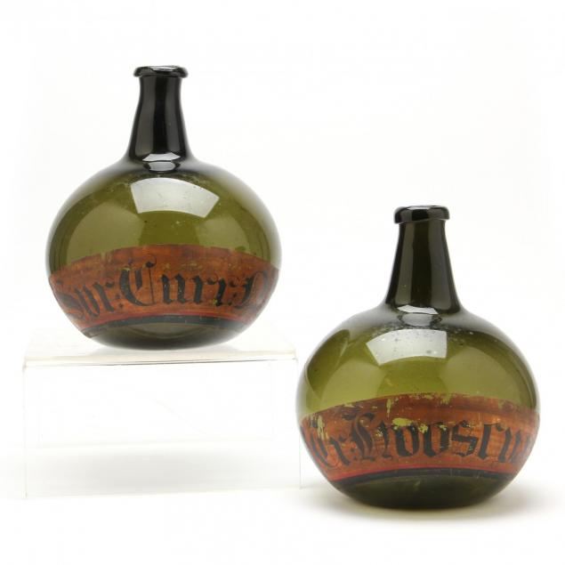 a-pair-of-onion-style-glass-apothecary-bottles
