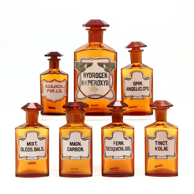 group-of-seven-amber-apothecary-bottles