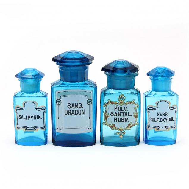 four-turquoise-apothecary-bottles