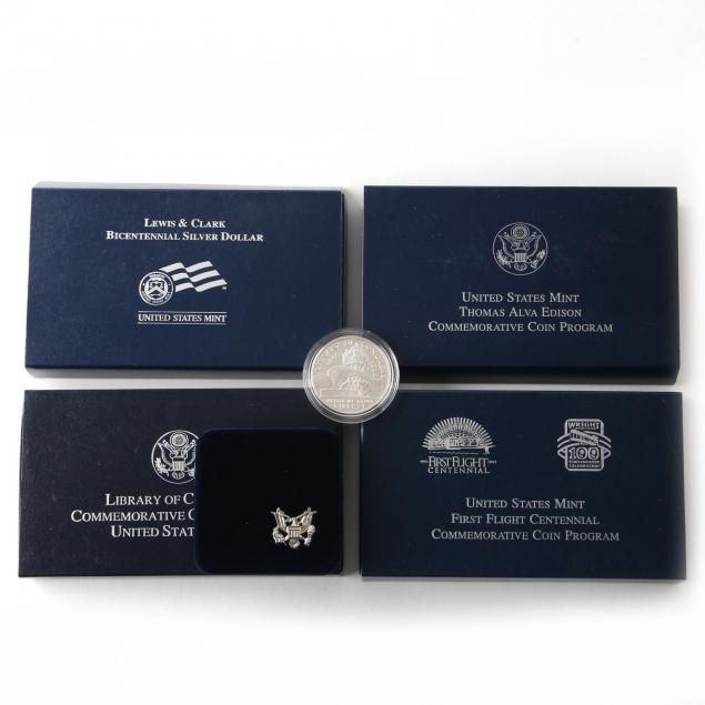 four-different-proof-commemorative-silver-dollars