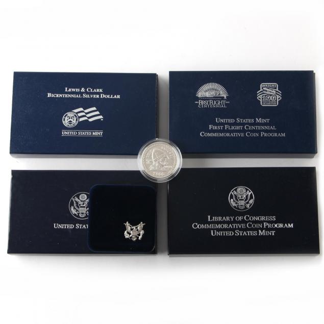 four-different-proof-commemorative-silver-dollars