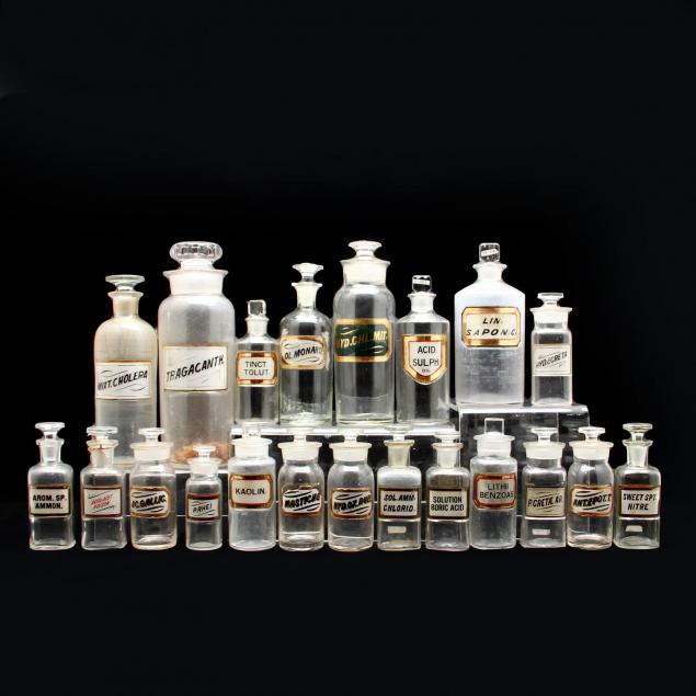 an-assortment-of-glass-apothecary-bottles