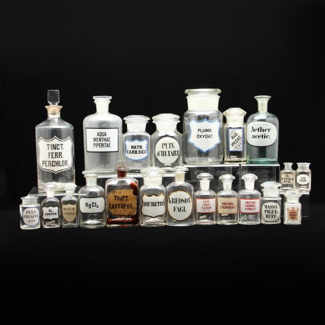 an-assortment-of-glass-apothecary-bottles