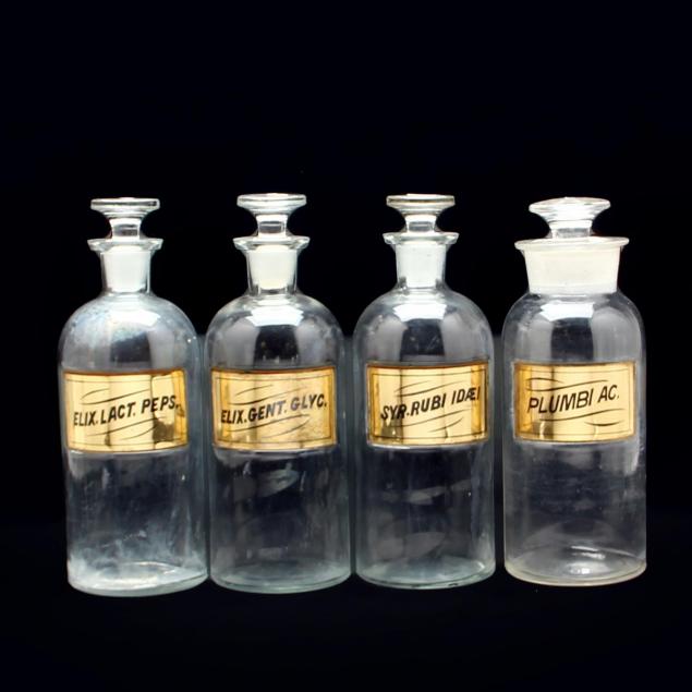 four-apothecary-bottles-w-tatum-co