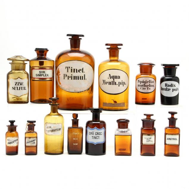 an-assembled-group-of-amber-apothecary-bottles