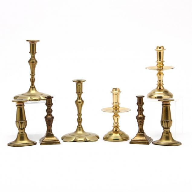 four-pair-of-miniature-brass-candlesticks