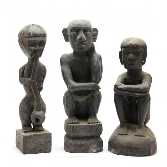three-tribal-carved-wooden-figures