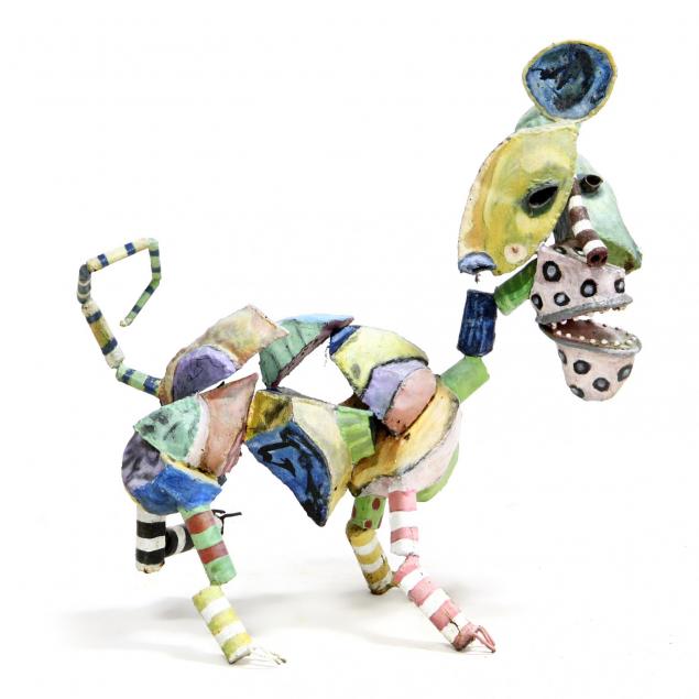 paint-decorated-outdoor-sculpture-of-a-surrealist-dog