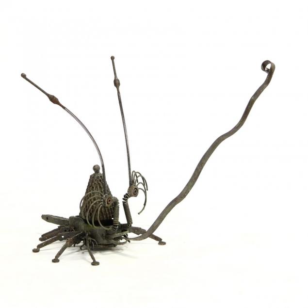 industrial-found-object-outdoor-sculpture-of-a-long-tongued-insect