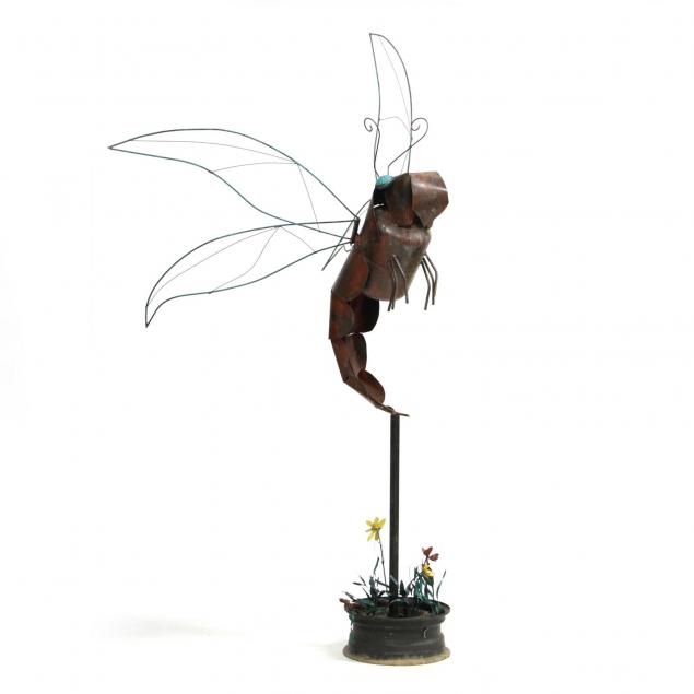 industrial-found-object-outdoor-sculpture-of-a-winged-insect