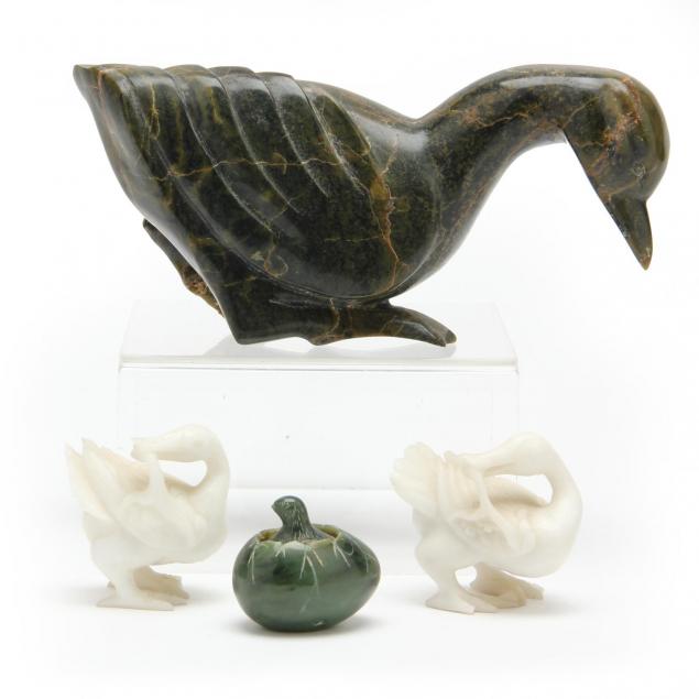 four-carved-stone-birds