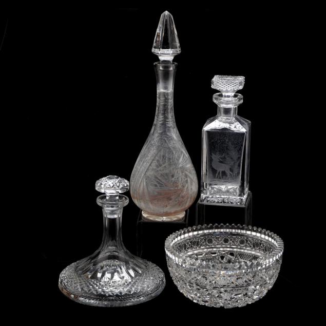 four-vintage-decanters-and-bowl