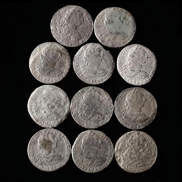 eleven-milled-silver-8-reales-salvaged-from-the-1784-i-el-cazador-i-shipwreck