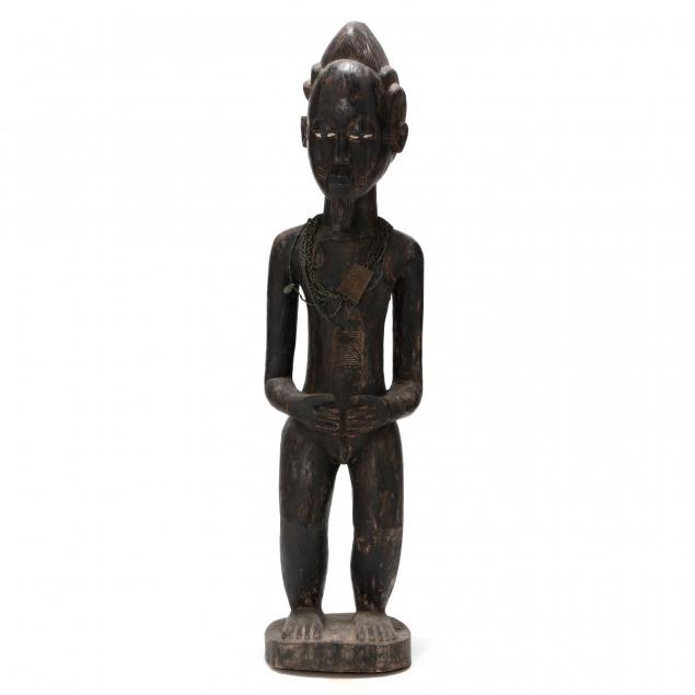 carved-wooden-standing-male-figure
