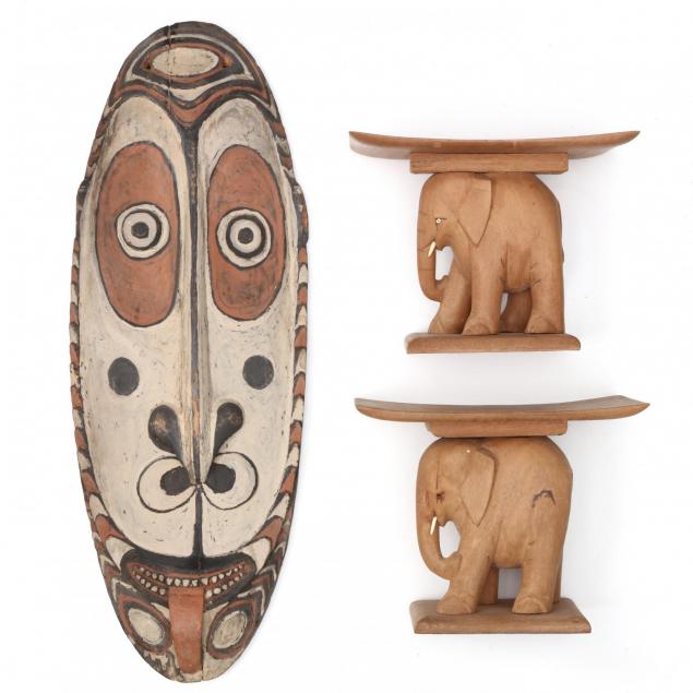 pair-of-wooden-african-elephant-benches-and-decorative-shield