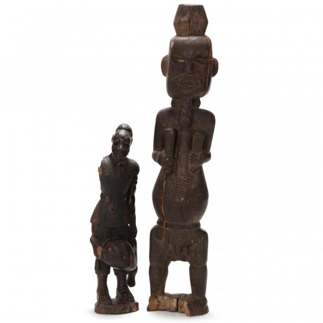 two-west-african-carved-wooden-male-statues