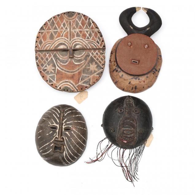 four-circular-form-west-african-masks
