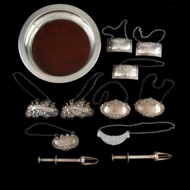 group-of-silver-and-pewter-bar-accessories