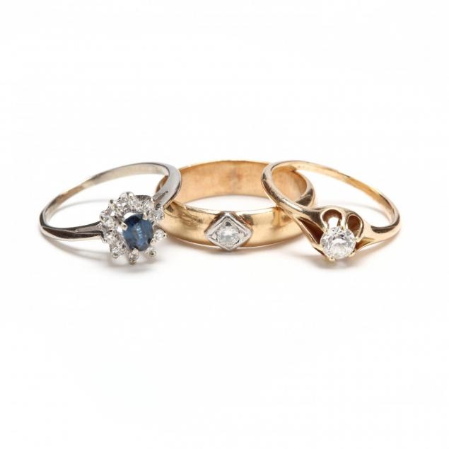 three-gold-and-gem-set-rings