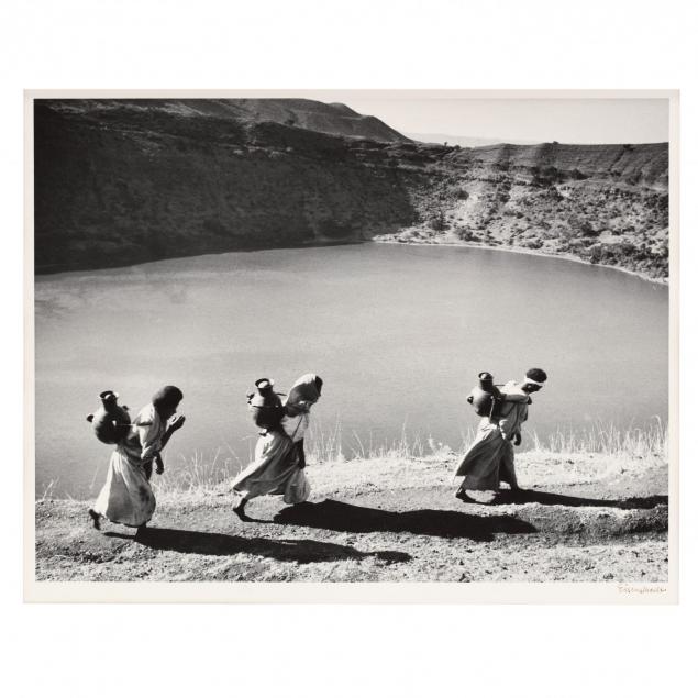 alfred-eisenstaedt-1898-1995-women-carrying-water-jugs-above-a-crater-lake