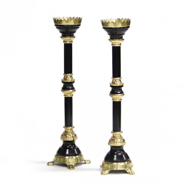 a-pair-of-brass-and-ebonized-candle-holders