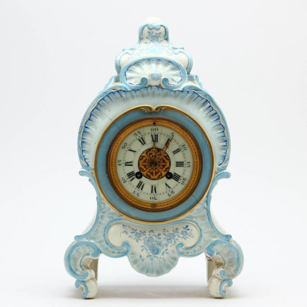 an-antique-french-faience-mantel-clock