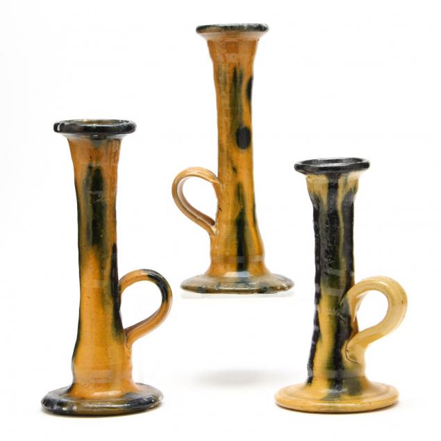 three-auman-pottery-candleholders