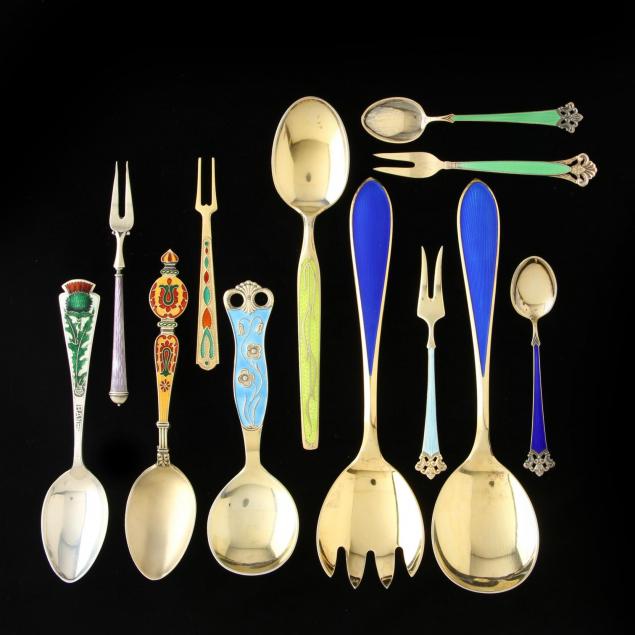 a-group-of-sterling-vermeil-and-enameled-flatware