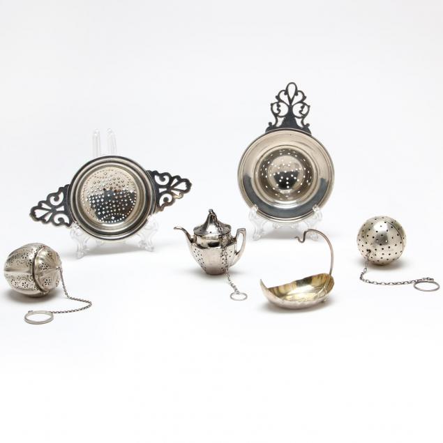 a-collection-of-sterling-silver-tea-strainers