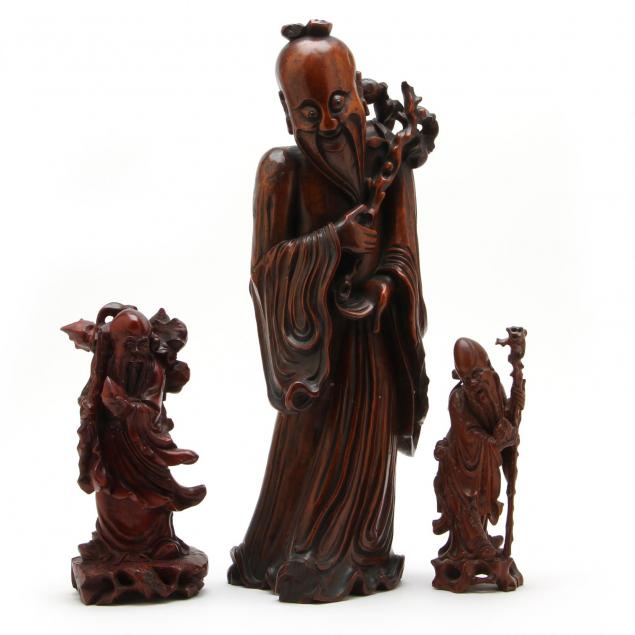 three-chinese-carved-wood-figures