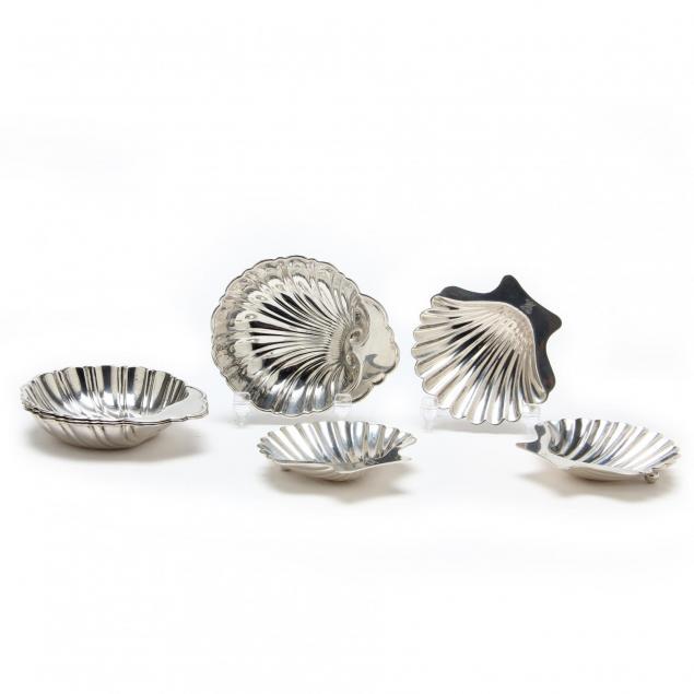 an-assembled-set-of-seven-sterling-silver-shells