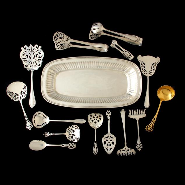 a-large-collection-of-sterling-silver-cutwork-servers