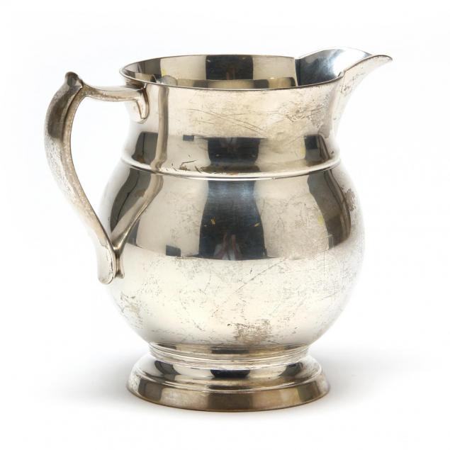 a-sterling-silver-milk-pitcher-by-tuttle-silversmiths