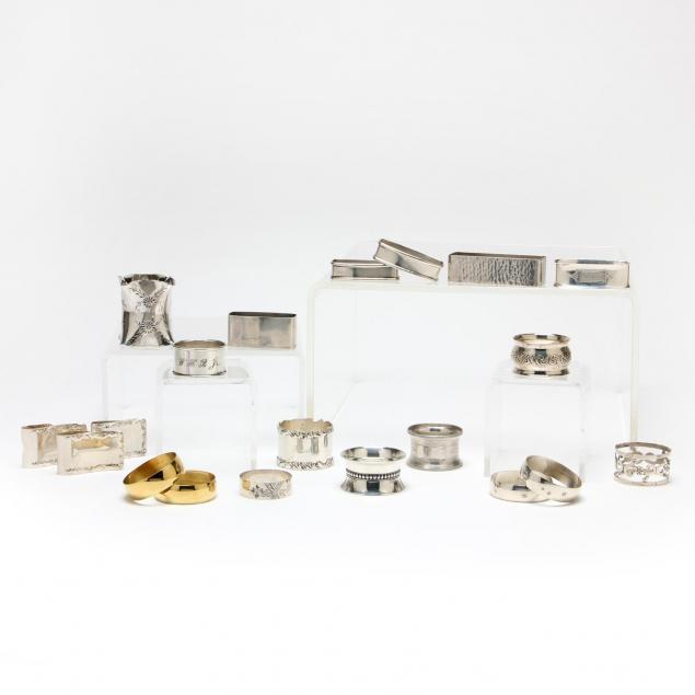 a-collection-of-twenty-sterling-silver-silverplate-napkin-rings